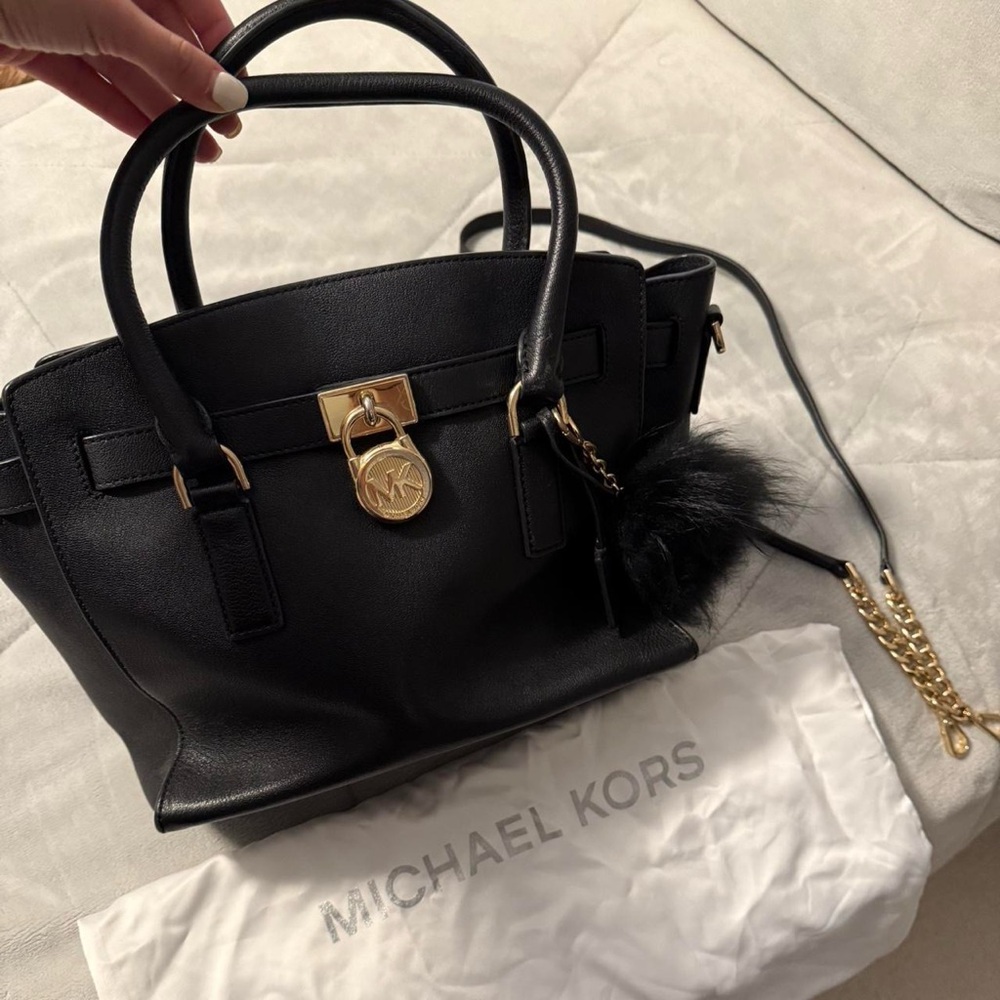 Black MK Purse with fluff ball attached!